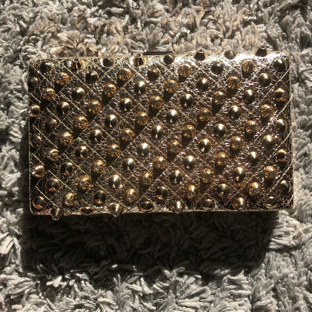 Gold studded clutch